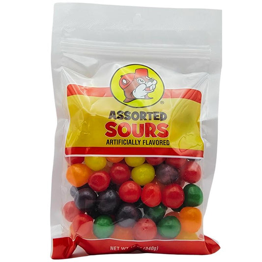 12 oz bag of Buc-ee’s Sweet & Sour Hard Ball Candy featuring assorted fruity flavors in colorful, eye-catching hard candy pieces.